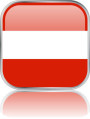 Man sieht im Bild die Flagge von Österreich auf einen Metallbutton plus Spiegel gestaltet. In Österreich gibt es 5 Bach Chöre, Bach Orchester oder Bach Vereine.